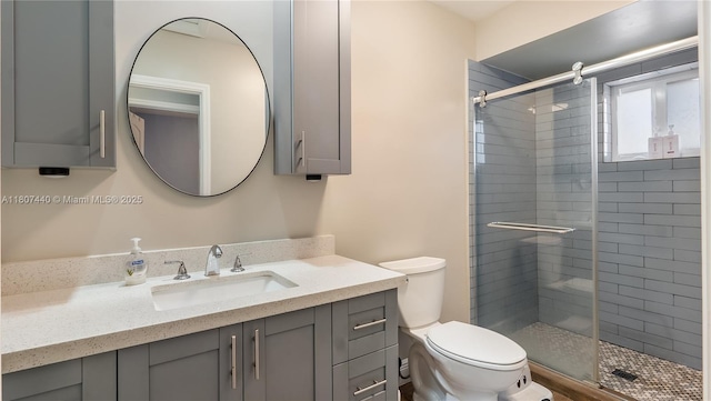 15 W 55th St, Hialeah, FL 33012 - full bathroom with a stall shower, toilet, and vanity