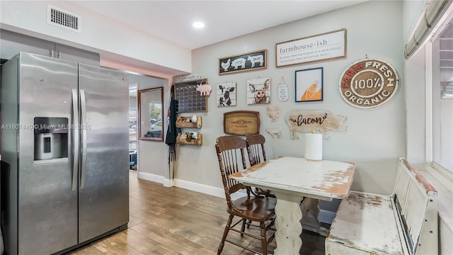 15 W 55th St, Hialeah, FL 33012 - dining space with baseboards, wood-type flooring, and recessed lighting