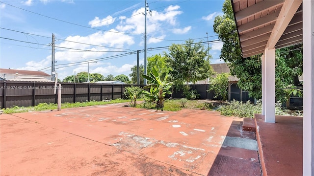 15 W 55th St, Hialeah, FL 33012 - fenced backyard with a patio