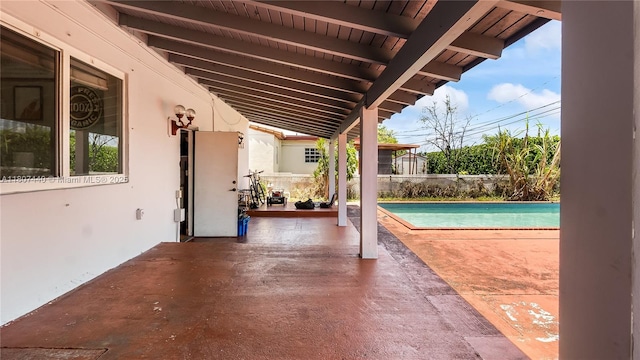 15 W 55th St, Hialeah, FL 33012 - view of swimming pool featuring a patio and a fenced backyard