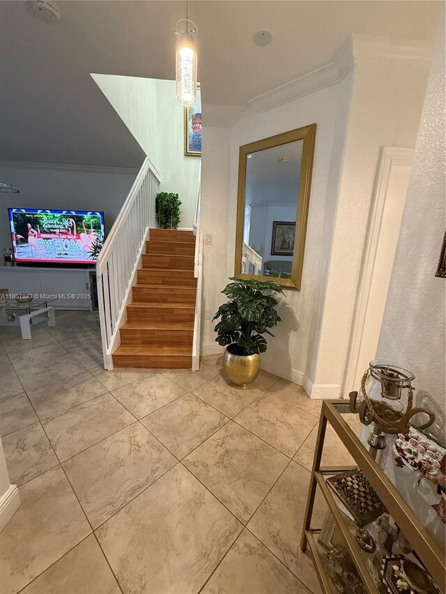 15029 SW 8th Ter, Miami, FL 33194 - staircase with crown molding and baseboards
