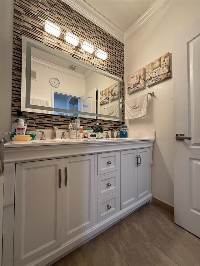 15029 SW 8th Ter, Miami, FL 33194 - bathroom featuring ornamental molding, double vanity, tasteful backsplash, and baseboards