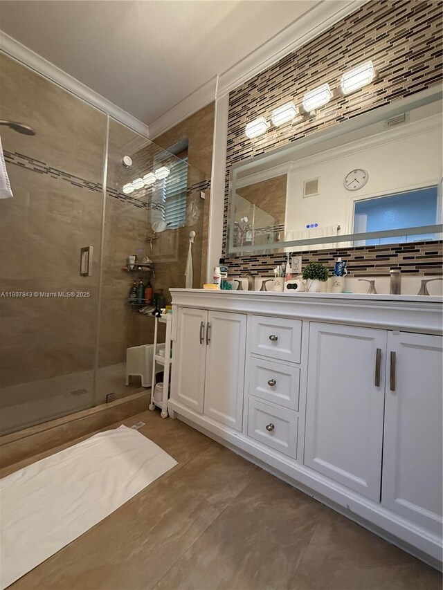 15029 SW 8th Ter, Miami, FL 33194 - bathroom featuring a shower stall, double vanity, and crown molding