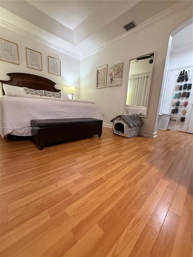 15029 SW 8th Ter, Miami, FL 33194 - bedroom with a raised ceiling, light wood finished floors, crown molding, and baseboards