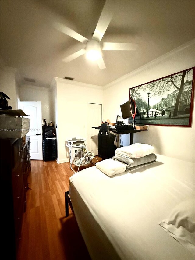 15029 SW 8th Ter, Miami, FL 33194 - bedroom with ornamental molding, wood finished floors, and ceiling fan