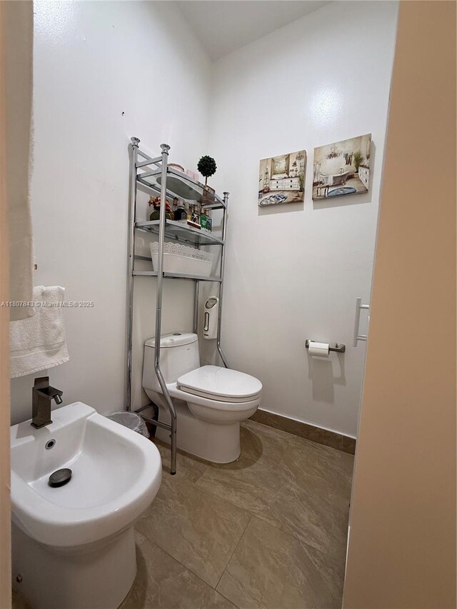 15029 SW 8th Ter, Miami, FL 33194 - half bath with a bidet, toilet, and a sink