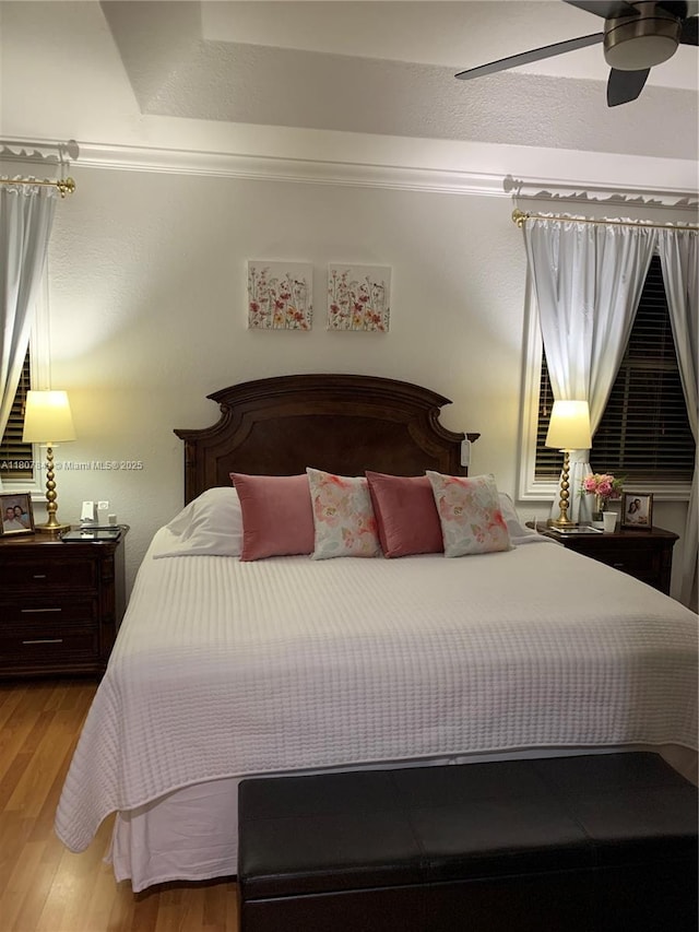 15029 SW 8th Ter, Miami, FL 33194 - bedroom with light wood finished floors and a ceiling fan
