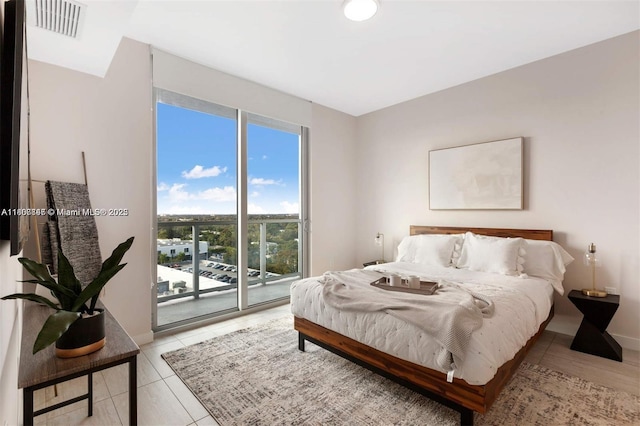 3900 Biscayne Blvd Unit N-905, Miami, FL 33137 - bedroom featuring access to exterior and light tile patterned flooring