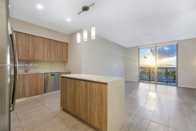 3900 Biscayne Blvd Unit N-905, Miami, FL 33137 - kitchen with appliances with stainless steel finishes, modern cabinets, light countertops, a sink, and light tile patterned floors