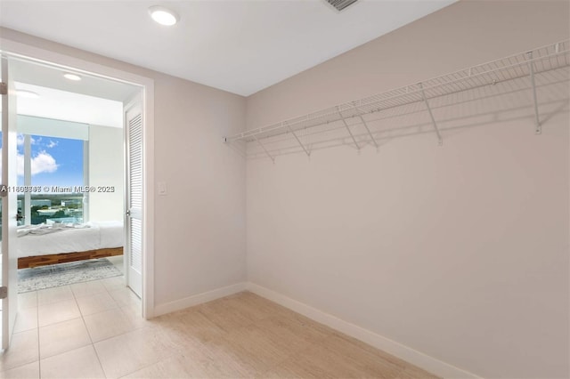 3900 Biscayne Blvd Unit N-905, Miami, FL 33137 - walk in closet featuring light tile patterned floors
