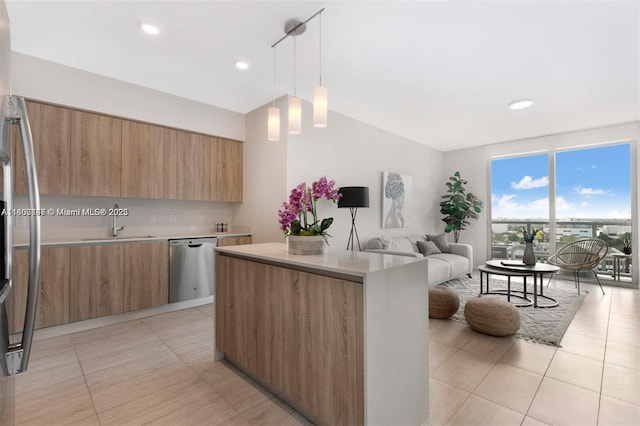 3900 Biscayne Blvd Unit N-905, Miami, FL 33137 - kitchen featuring modern cabinets, stainless steel appliances, open floor plan, light countertops, and a sink
