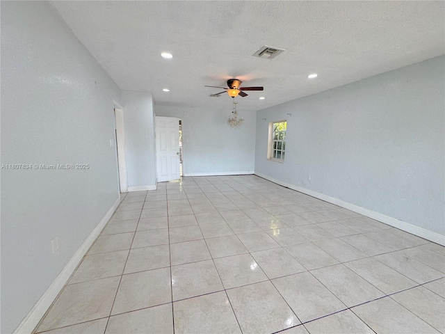 18201 NW 20th Ave, Miami Gardens, FL 33056 - spare room with ceiling fan, recessed lighting, light tile patterned floors, baseboards, and a textured ceiling