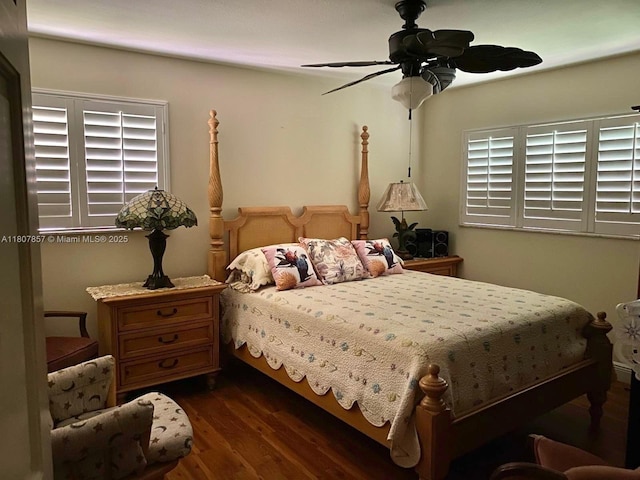 7707 Ashmont Cir Unit 214, Tamarac, FL 33321 - bedroom with wood finished floors and a ceiling fan