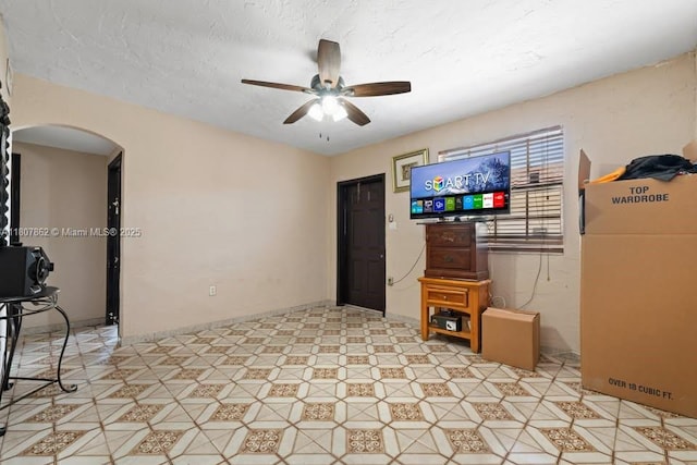 2655 NW 14th Ave, Miami, FL 33142 - spare room featuring arched walkways and a ceiling fan