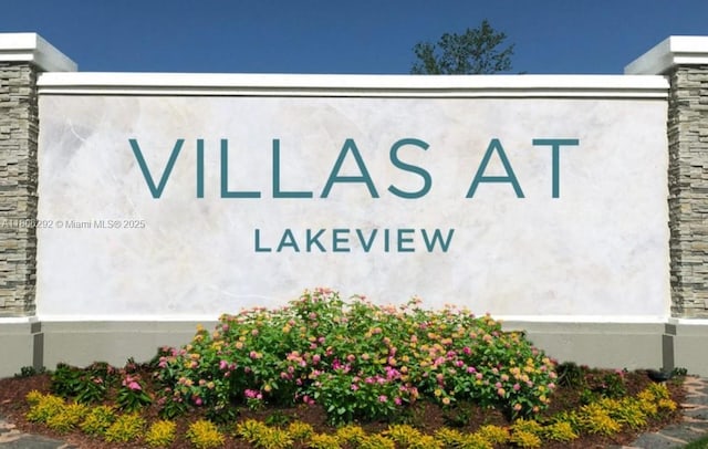 5200 NW 31st Ave Unit 102, Fort Lauderdale, FL 33309 - view of community / neighborhood sign
