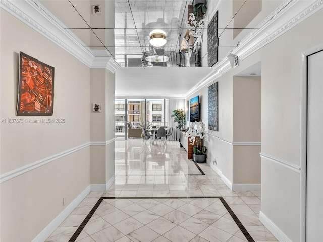 10155 Collins Ave Unit 408, Bal Harbour, FL 33154 - hall featuring inlaid floor details, marble finish floors, a high ceiling, and crown molding