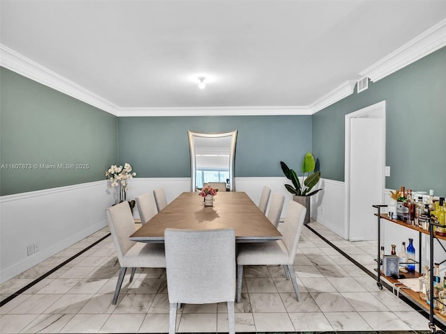 10155 Collins Ave Unit 408, Bal Harbour, FL 33154 - dining area with light marble finish floors and crown molding