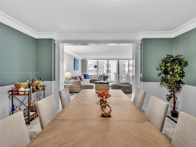10155 Collins Ave Unit 408, Bal Harbour, FL 33154 - dining space with crown molding, ornate columns, and light tile patterned floors