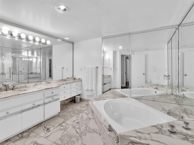 10155 Collins Ave Unit 408, Bal Harbour, FL 33154 - full bath with vanity, a garden tub, marble finish flooring, and recessed lighting