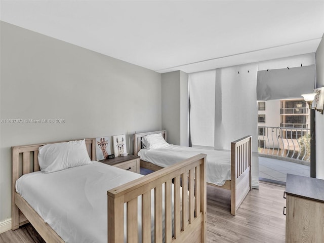 10155 Collins Ave Unit 408, Bal Harbour, FL 33154 - bedroom with light wood-type flooring