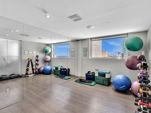 10155 Collins Ave Unit 408, Bal Harbour, FL 33154 - workout area featuring recessed lighting and baseboards