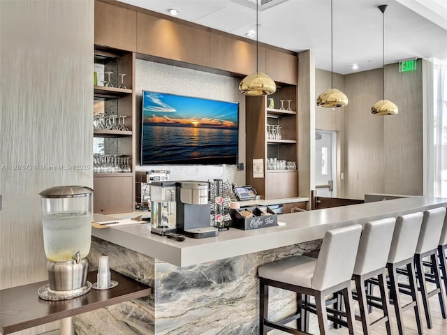 10155 Collins Ave Unit 408, Bal Harbour, FL 33154 - bar featuring built in shelves and pendant lighting