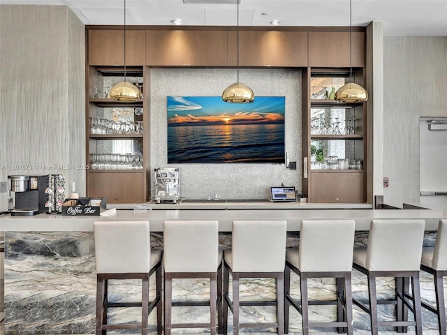 10155 Collins Ave Unit 408, Bal Harbour, FL 33154 - kitchen featuring a kitchen bar