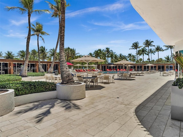 10155 Collins Ave Unit 408, Bal Harbour, FL 33154 - view of home's community featuring a swimming pool and a patio area