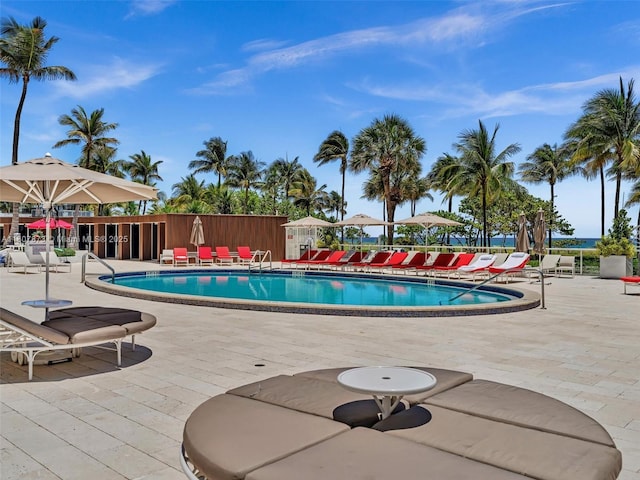 10155 Collins Ave Unit 408, Bal Harbour, FL 33154 - community pool featuring a patio