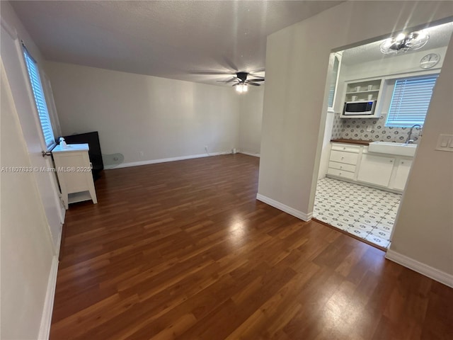 1717 Rodman St Unit 18, Hollywood, FL 33020 - spare room with ceiling fan, a sink, wood finished floors, and baseboards