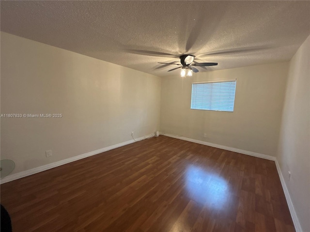 1717 Rodman St Unit 18, Hollywood, FL 33020 - empty room with dark wood finished floors, a ceiling fan, a textured ceiling, and baseboards