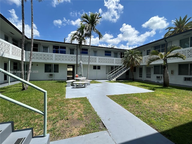 1717 Rodman St Unit 18, Hollywood, FL 33020 - view of property's community featuring a lawn
