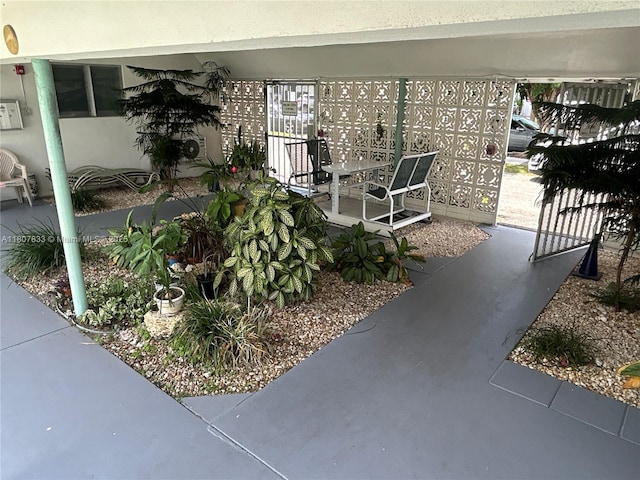 1717 Rodman St Unit 18, Hollywood, FL 33020 - doorway to property featuring a patio and stucco siding
