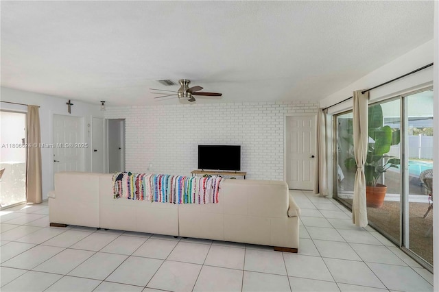 2001 NW 93rd Ln, Sunrise, FL 33322 - living area with ceiling fan and light tile patterned floors