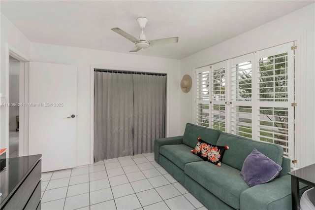 2001 NW 93rd Ln, Sunrise, FL 33322 - living area with a ceiling fan and light tile patterned flooring