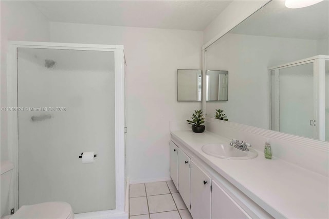 2001 NW 93rd Ln, Sunrise, FL 33322 - full bath featuring vanity, tile patterned floors, a shower stall, toilet, and baseboards