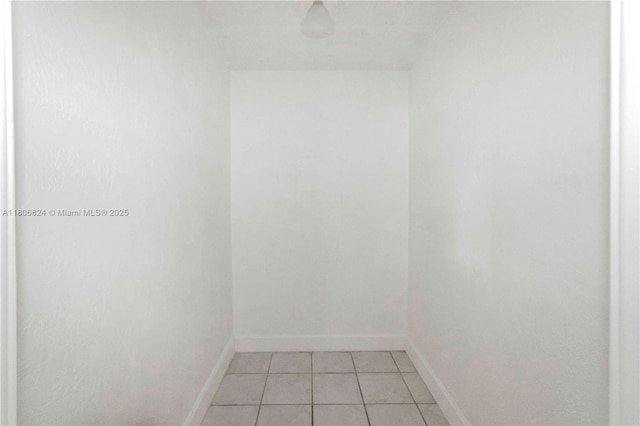 2001 NW 93rd Ln, Sunrise, FL 33322 - spare room with baseboards and light tile patterned floors