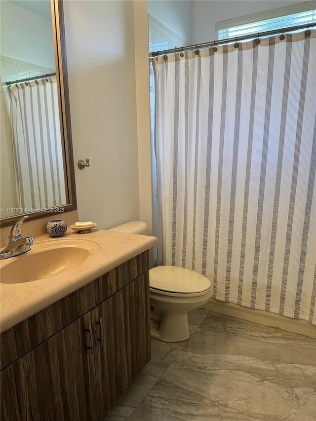 3700 Oak Ridge Ln, Weston, FL 33331 - bathroom featuring vanity, marble finish flooring, toilet, and curtained shower