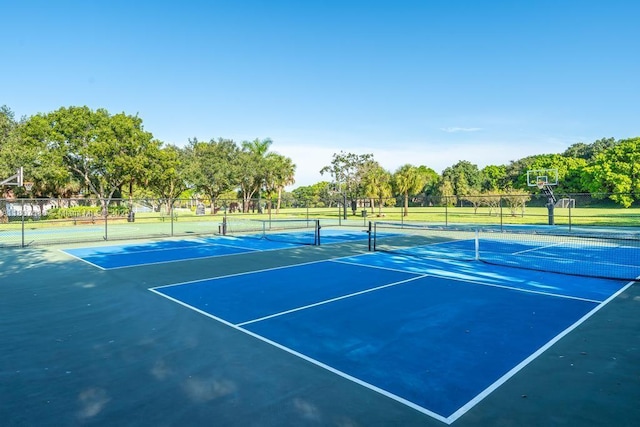 3700 Oak Ridge Ln, Weston, FL 33331 - view of tennis court with view of wooded area