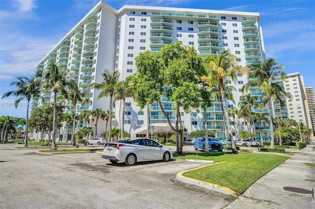 19380 Collins Ave Unit 718, Sunny Isles Beach, FL 33160 - view of apartment building / complex with uncovered parking