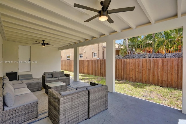 2978 SW 14th St, Miami, FL 33145 - fenced backyard featuring ceiling fan, an outdoor living space, and a patio