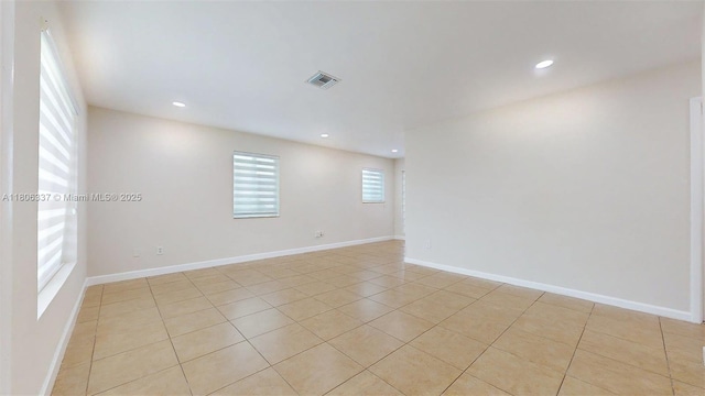 5301 SW 111th Ave, Miami, FL 33165 - spare room featuring recessed lighting, light tile patterned floors, and baseboards