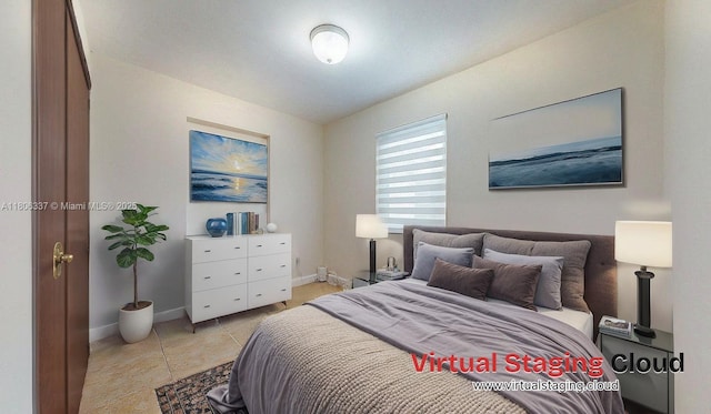 5301 SW 111th Ave, Miami, FL 33165 - bedroom with baseboards and light tile patterned flooring