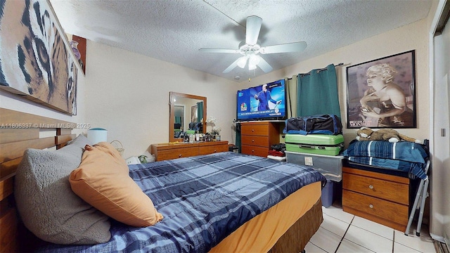 5301 SW 111th Ave, Miami, FL 33165 - bedroom featuring a textured ceiling, light tile patterned floors, and a ceiling fan