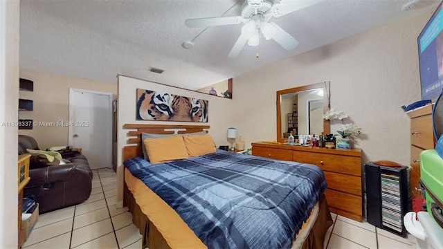 5301 SW 111th Ave, Miami, FL 33165 - bedroom with light tile patterned floors, a textured ceiling, and ceiling fan