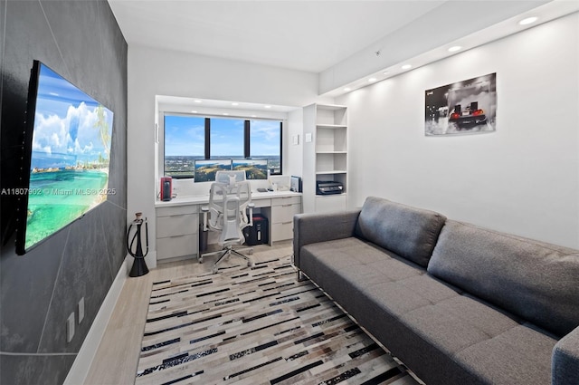 650 NE 32nd St Unit 4101, Miami, FL 33137 - home office with light wood finished floors, built in study area, and recessed lighting