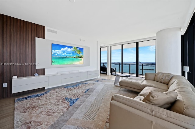 650 NE 32nd St Unit 4101, Miami, FL 33137 - living room featuring floor to ceiling windows and wood finished floors
