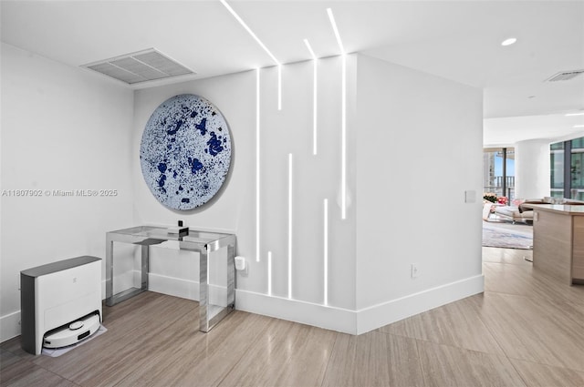 650 NE 32nd St Unit 4101, Miami, FL 33137 - hallway featuring baseboards, wood finished floors, and recessed lighting