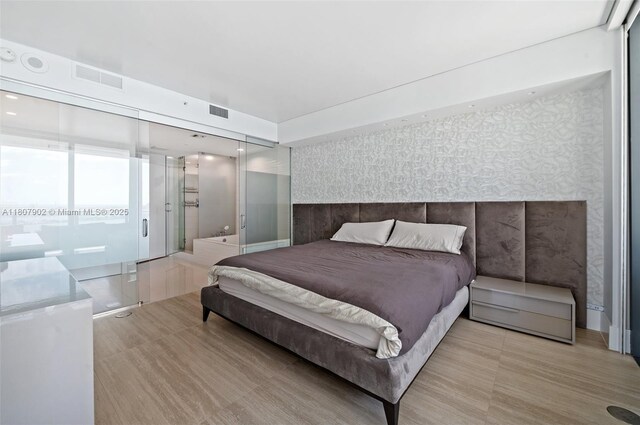 650 NE 32nd St Unit 4101, Miami, FL 33137 - bedroom with wallpapered walls