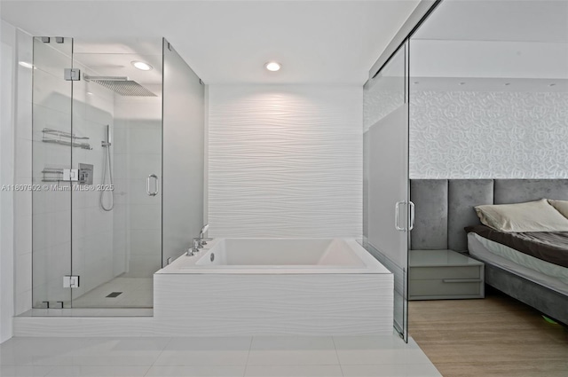 650 NE 32nd St Unit 4101, Miami, FL 33137 - full bathroom with a bath, a stall shower, ensuite bath, tile patterned flooring, and recessed lighting